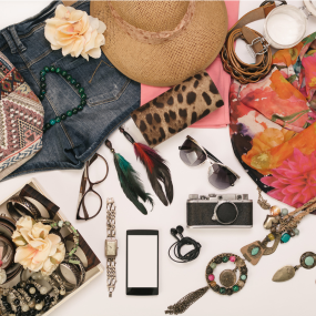 Fashion accessories placed next to each other as a fashion mood board Pexels via Canva